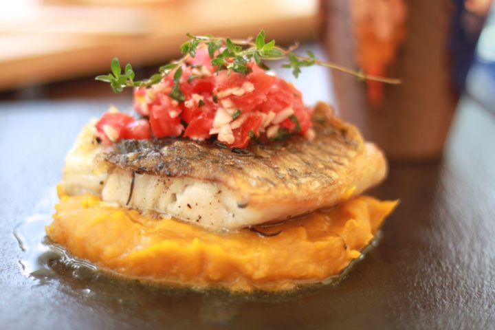 grilled snapper served with a salty, tangy salsa, colourful pumpkin puree and crisp, sautéed vegetables